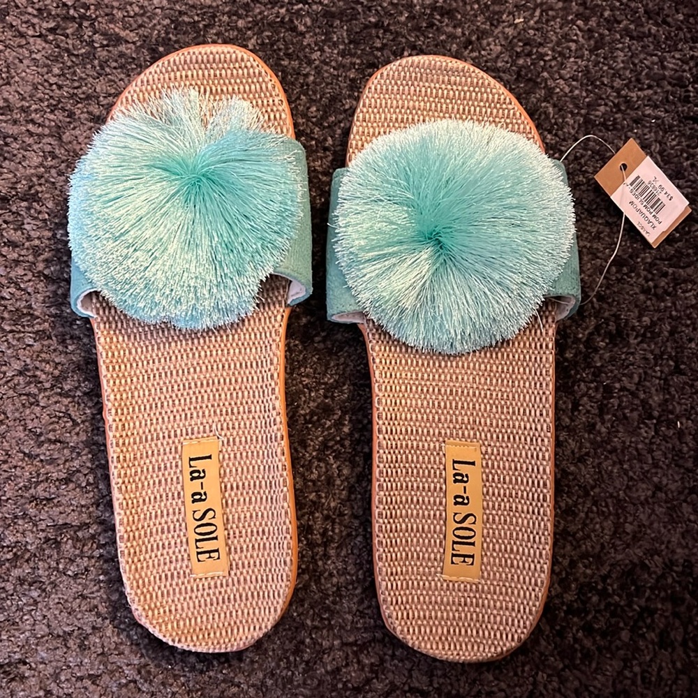 New La-a Sole Sandals with tags on them!